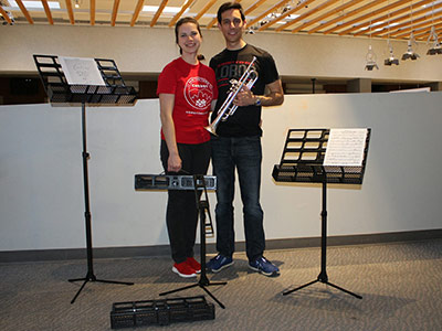 STUDENT ENTREPRENEURS MAKE A PITCH FOR MUSIC STAND BUSINESS